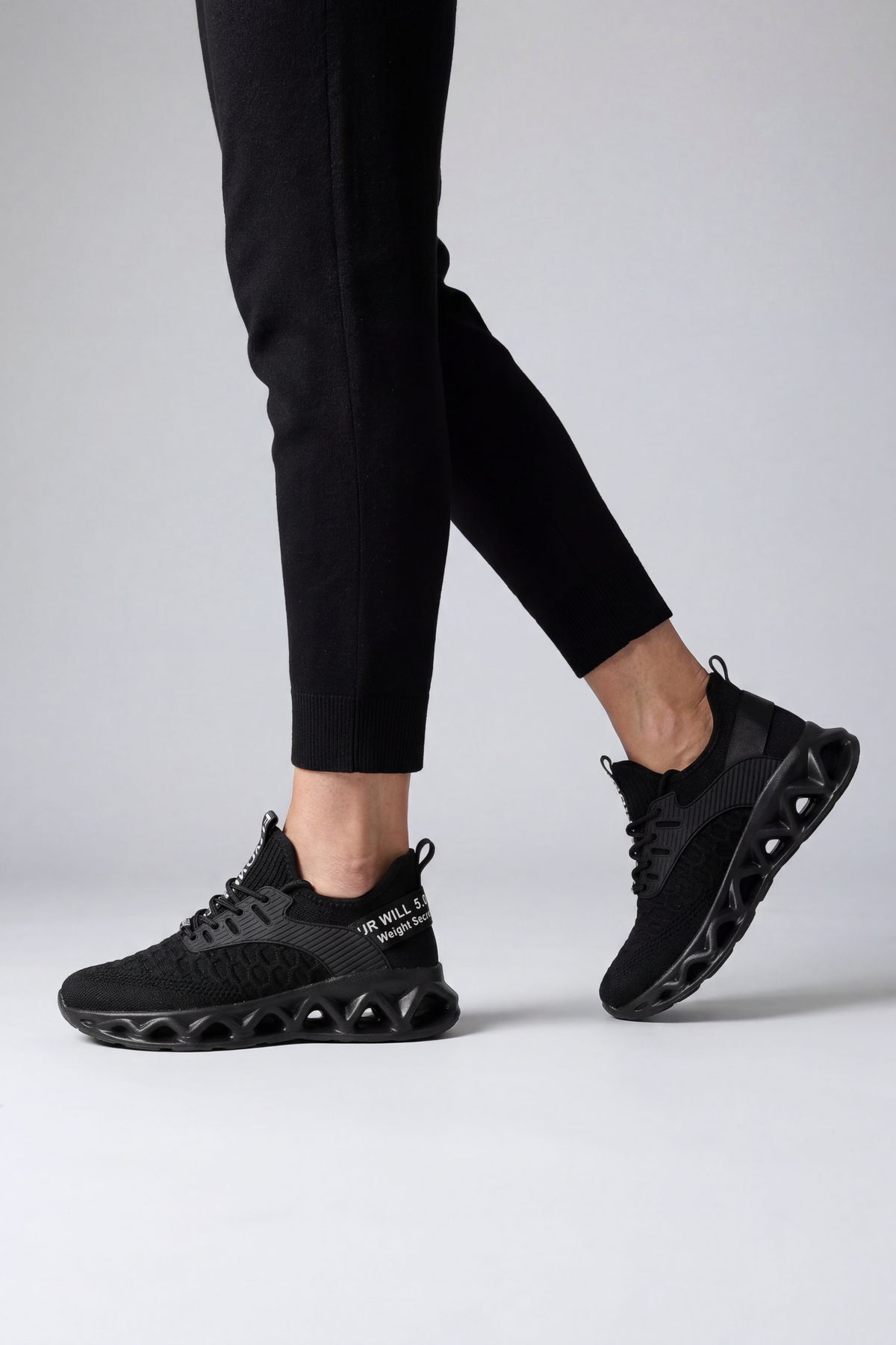 Sporty Knitted Upper Sneakers with Wave Cutout Sole